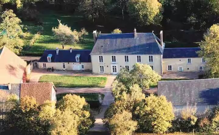 The manor house and its outbuildings from the air